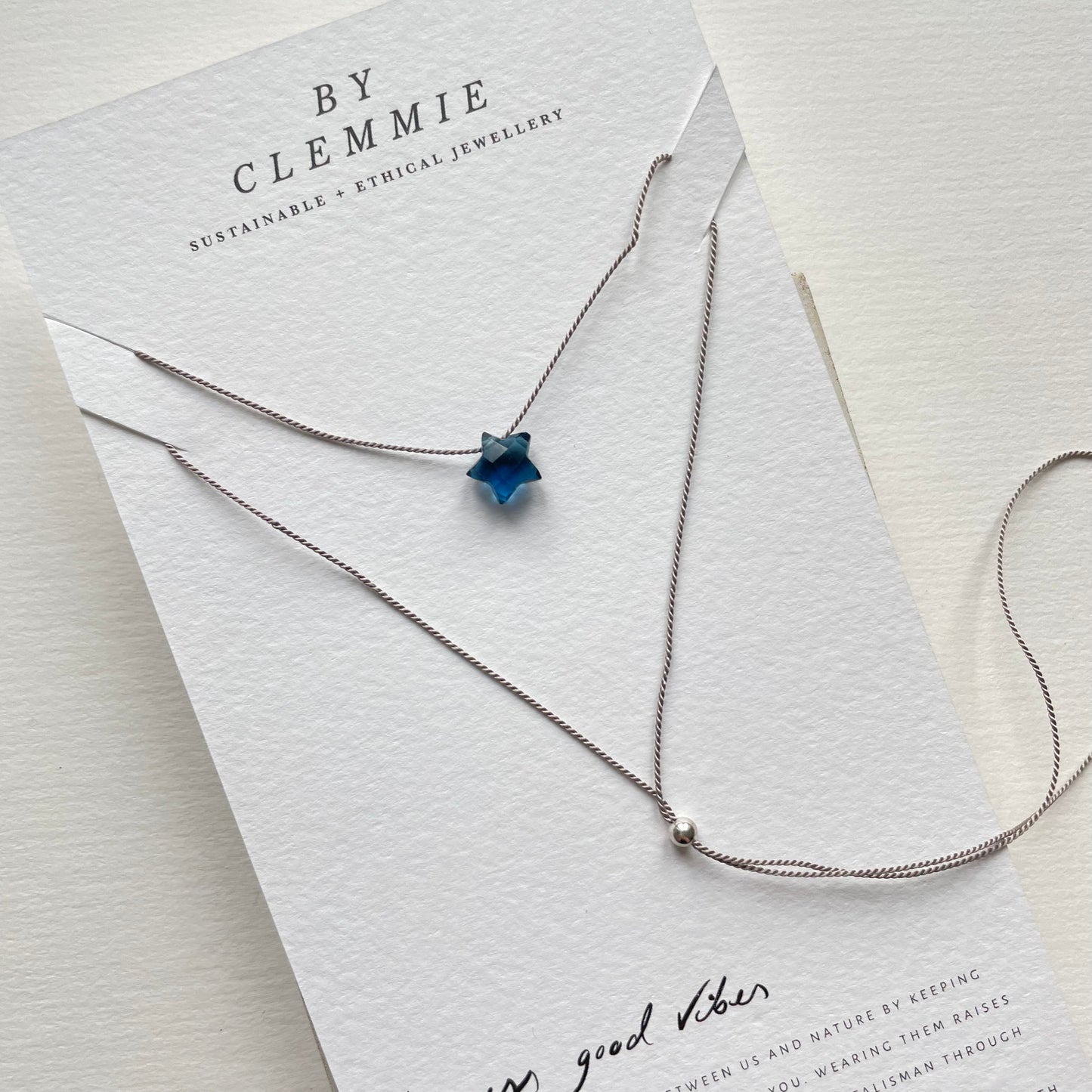 Silk Charm Necklace | Blue Topaz Star