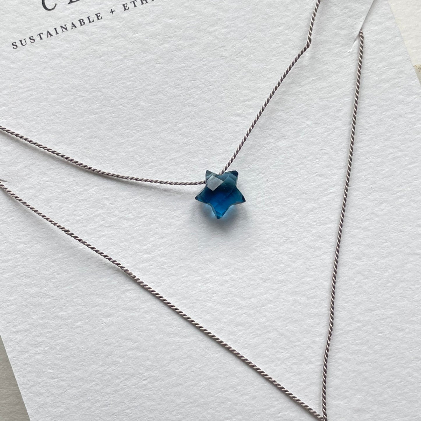 Silk Charm Necklace | Blue Topaz Star