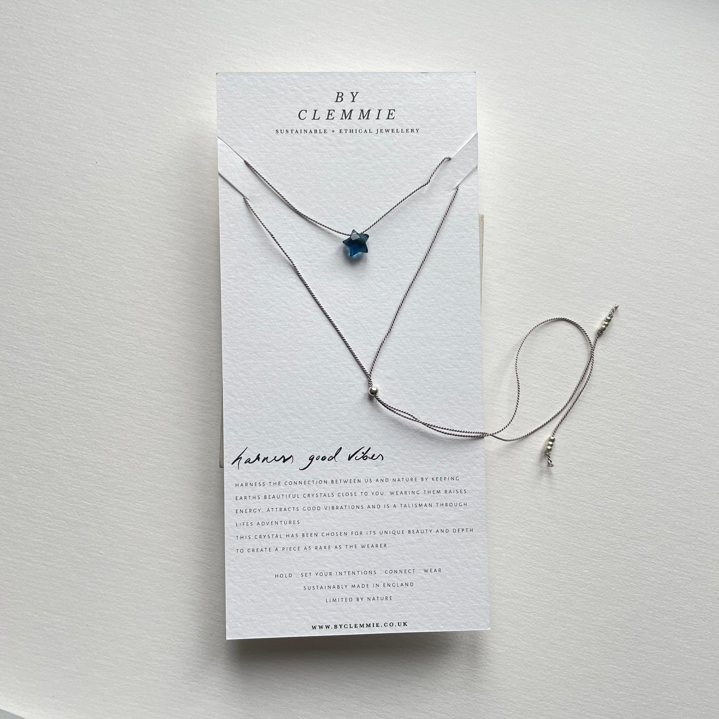 Silk Charm Necklace | Blue Topaz Star